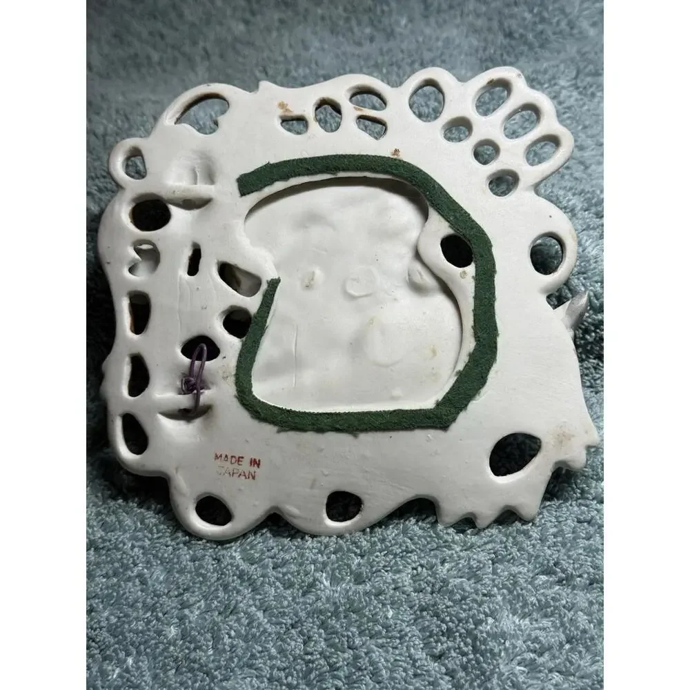 Vintage Porcelain Wall Plaque With Cherub And Floral Design